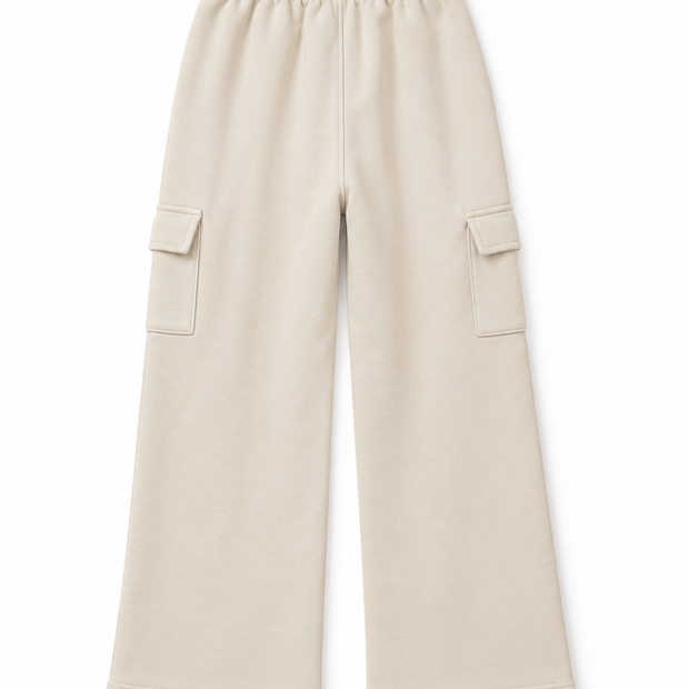 Back view of boys and girls cream terry cargo trousers with wide-leg silhouette and elasticated waistband