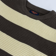 Close-up view of the soft espresso brown and buttercream striped texture with a ribbed crew neck on the boys acrylic sweater.