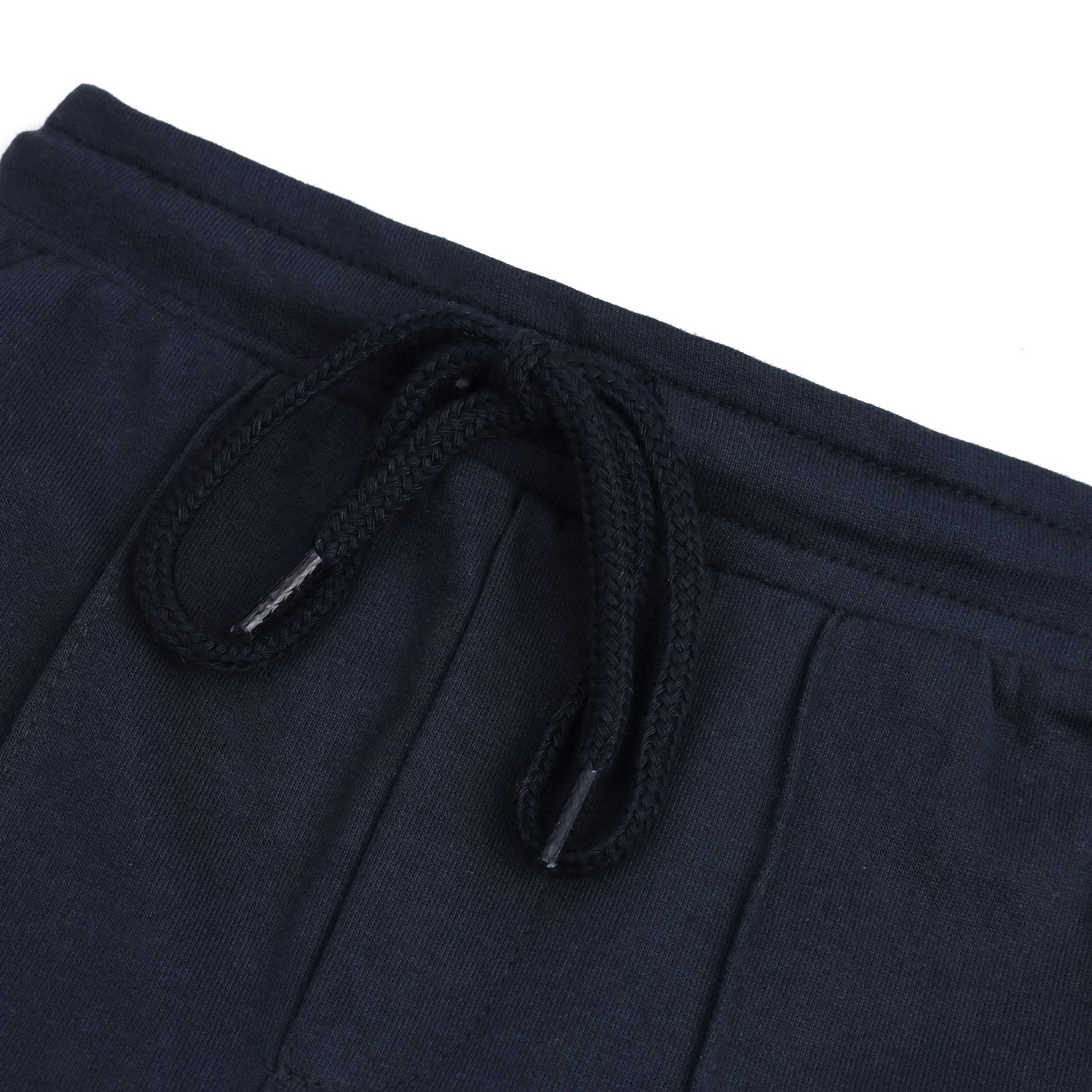 Close-up of the elasticated waistband and matching braided drawstring on the boys navy fleece joggers.