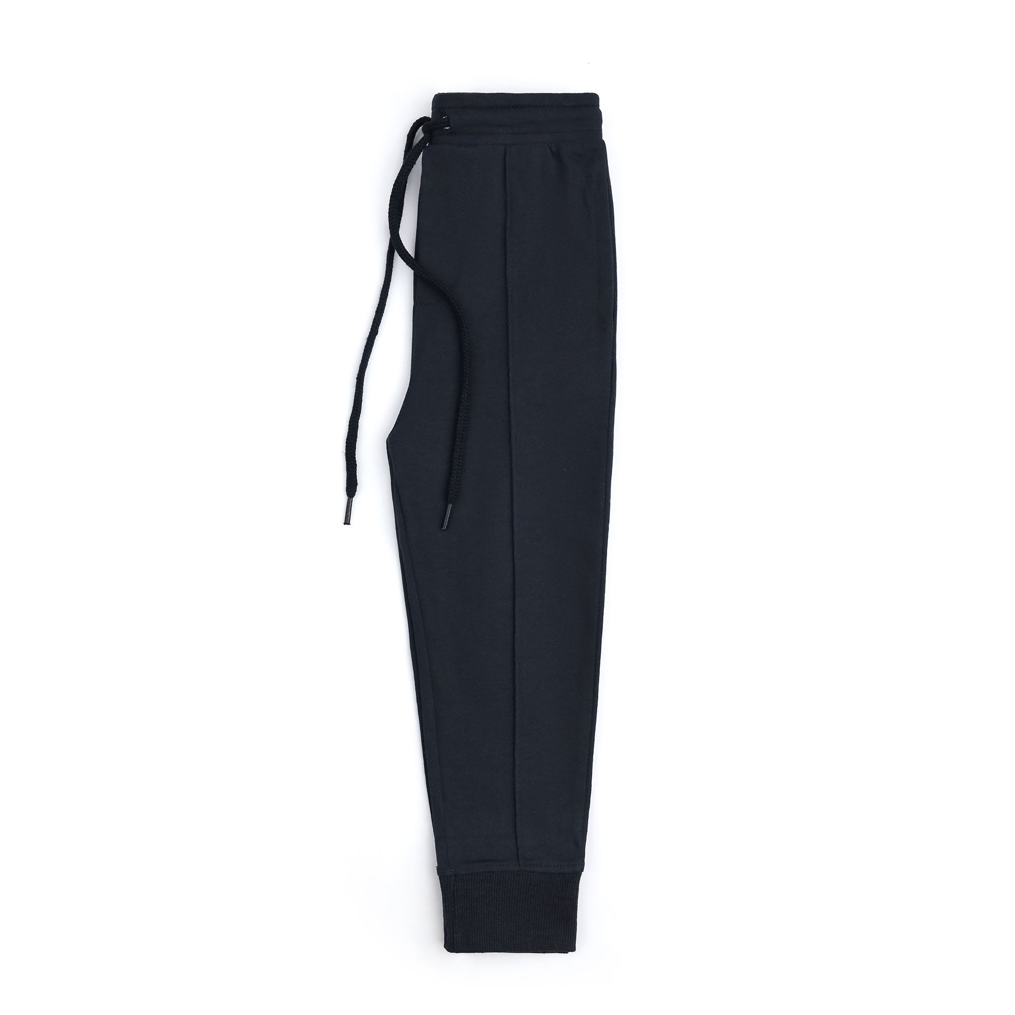 Side view of the boys navy fleece joggers showing the side pocket, pintuck seam and ribbed ankle cuff.