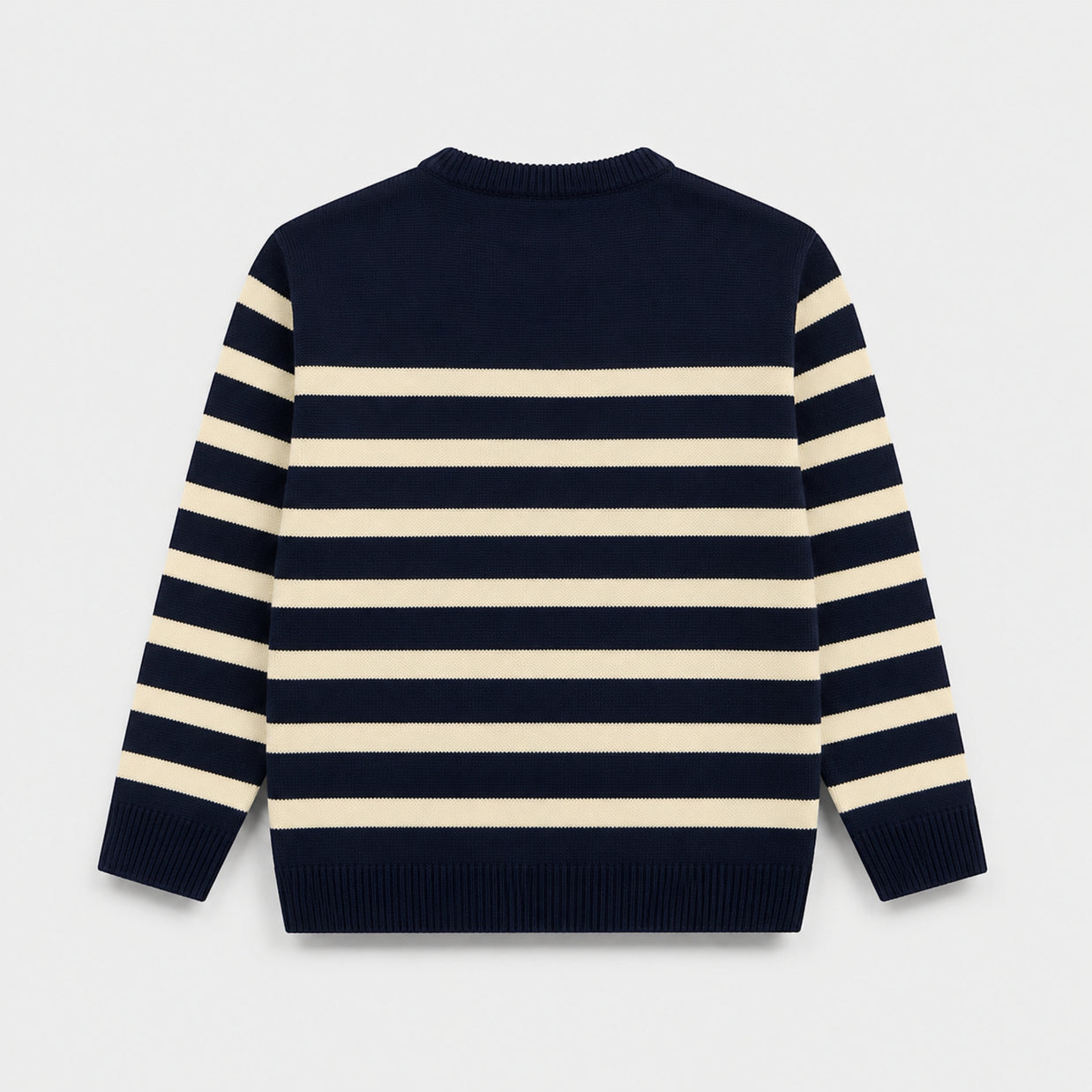 Back view of a boys Atlantic Navy and cream striped acrylic sweater displaying horizontal stripes across the body and sleeves.