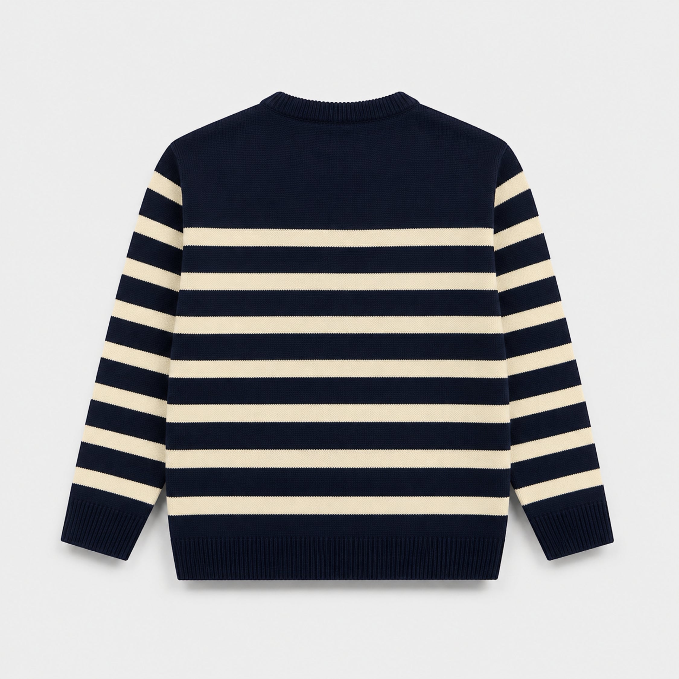 Back view of a boys Atlantic Navy and cream striped acrylic sweater displaying horizontal stripes across the body and sleeves.