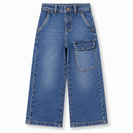 Front view of boys and girls medium blue washed wide leg jeans with large front patch pockets