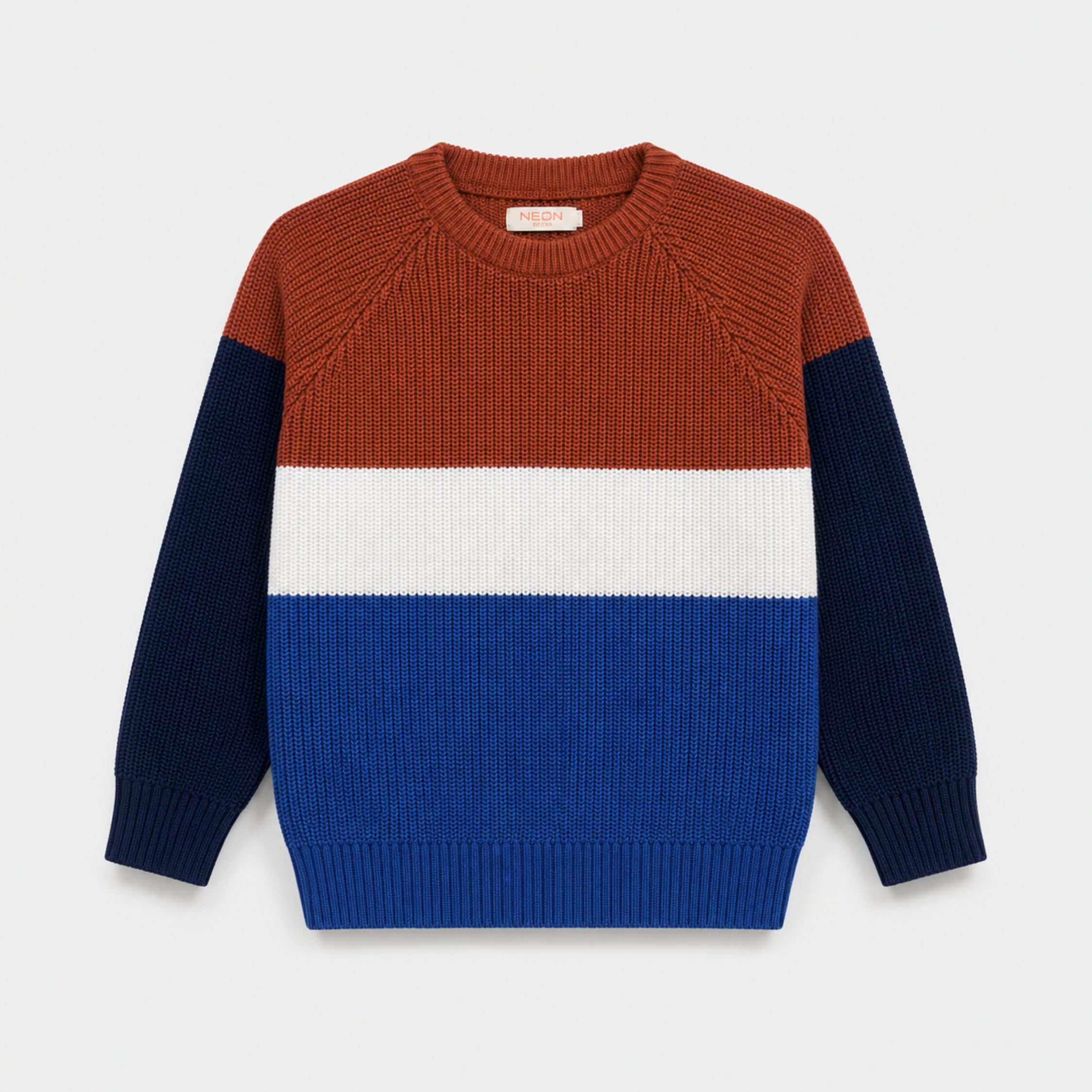 Front view of the Color Block Sweater for boys, featuring rust, white, royal blue and Navy blue sections with raglan sleeves and ribbed finishes.