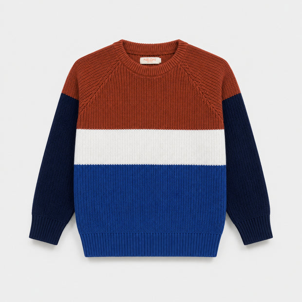 Front view of the Color Block Sweater for boys, featuring rust, white, royal blue and Navy blue sections with raglan sleeves and ribbed finishes.