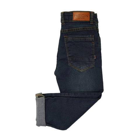 Back view of the kids dark indigo denim showing the back pocket, cuffed hem and branded waist patch.