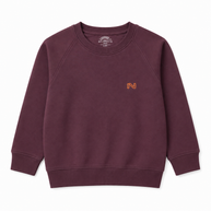 Front view of the boys burgundy fleece sweatshirt featuring a small orange embroidered N logo, round ribbed neckline and raglan sleeves.