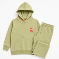 Complete view of the girls pistachio-green fleece co-ord set featuring a Yes You Can graphic hoodie with matching wide-leg trousers.
