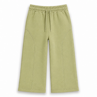 Front view of the girls pistachio-green fleece wide-leg trousers featuring an elasticated drawstring waist and curved front seam detailing.