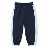 Back view of boys navy fleece joggers featuring light-blue side stripes, an elasticated waist and ankle cuffs.
