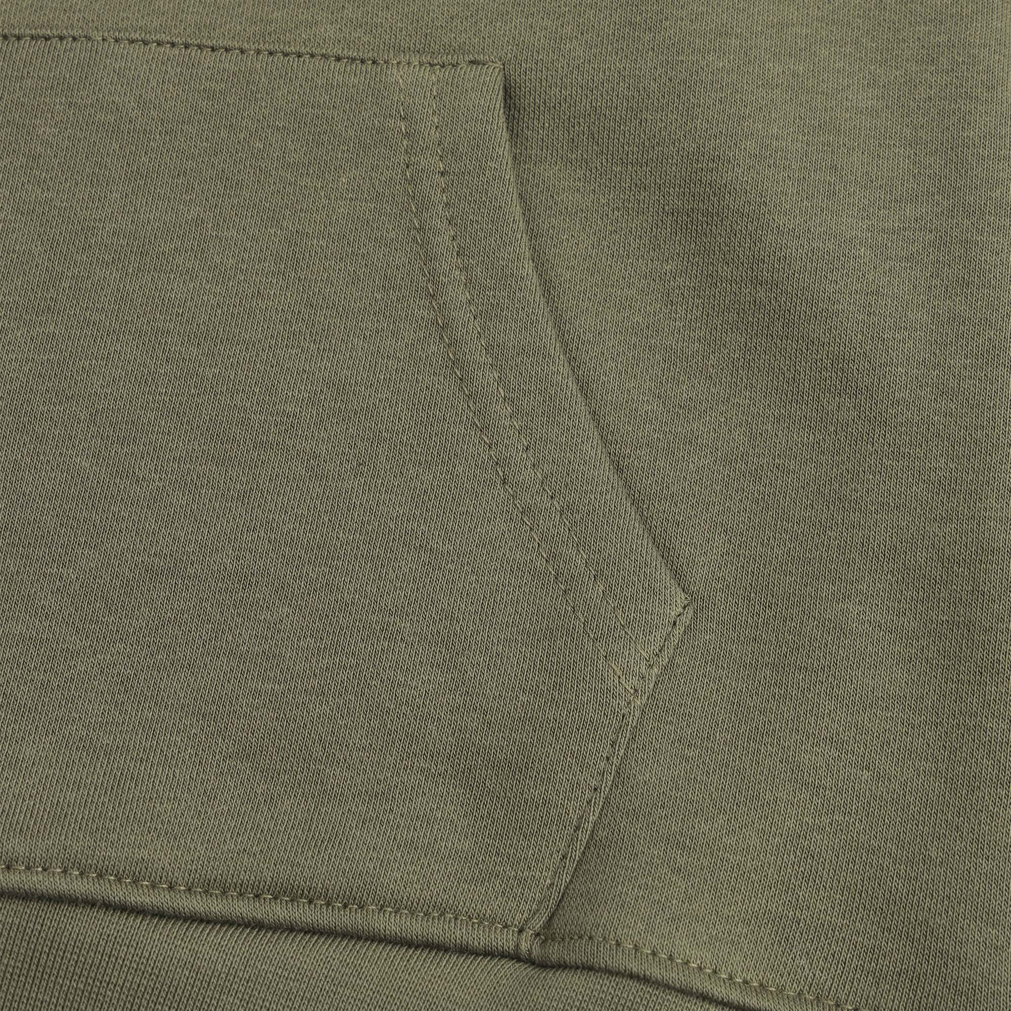 Close-up view of the boys olive fleece hoodie showing the spacious kangaroo pocket, neat tonal stitching and ribbed bottom finish.