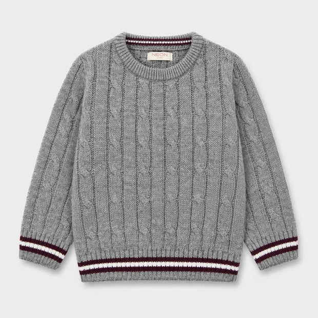 Front view of a heather-grey cable-knit sweater for boys, featuring a crew neck and contrasting burgundy and white stripes along the ribbed cuffs and bottom edge.