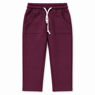 Front view of girls deep berry fleece trousers with patch pockets and off-white drawstring waist