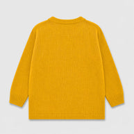 Back view of the mustard yellow acrylic sweater for girls, showing a plain knit design, long sleeves and ribbed neckline, cuffs and bottom edge.