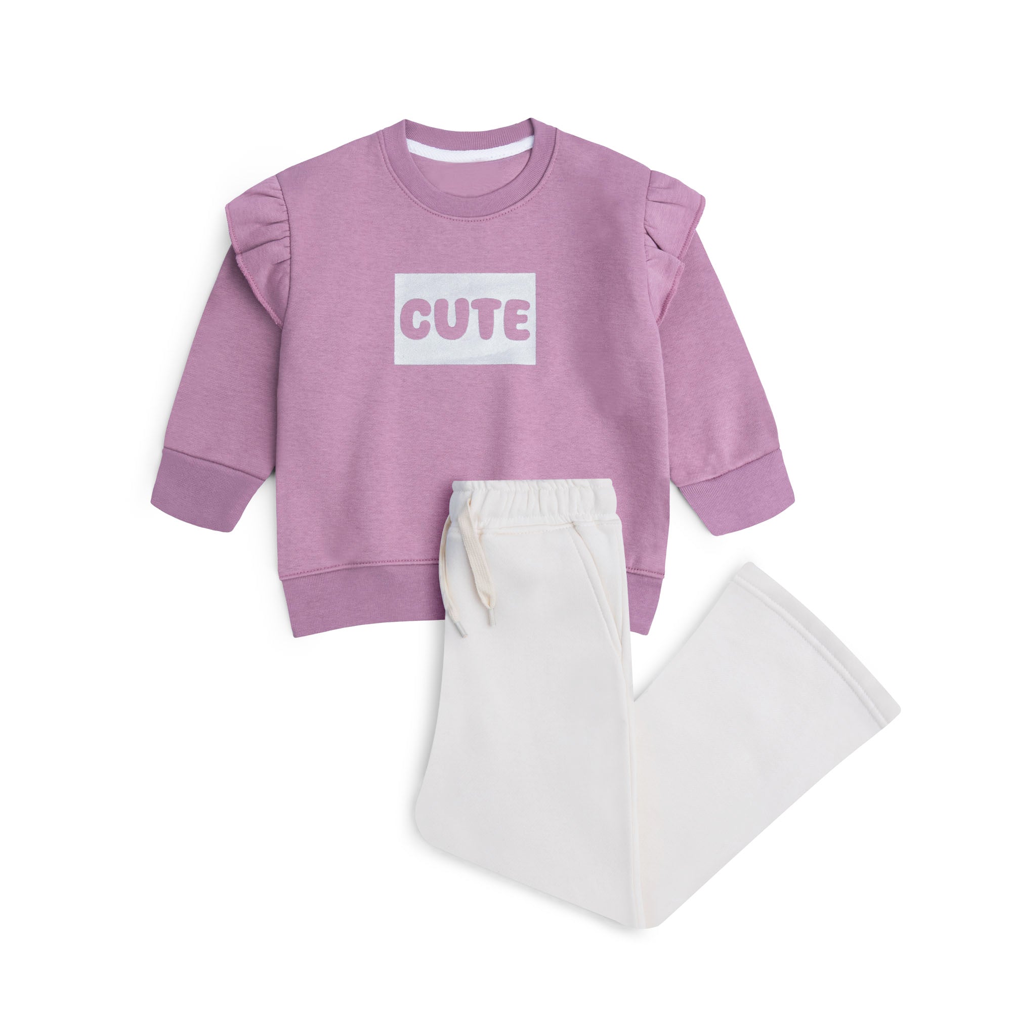Girls fleece co-ord set featuring a dusty pink CUTE graphic sweatshirt with ruffle shoulders and off-white wide-leg drawstring trousers.