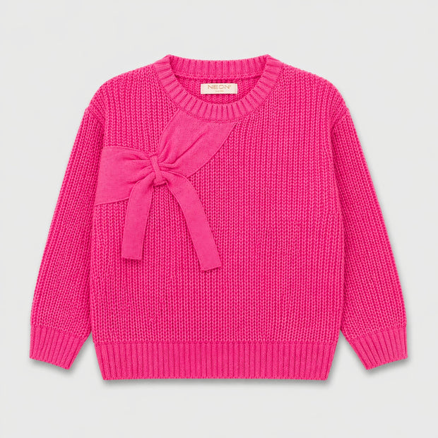 Front view of a hot pink girls sweater featuring a textured finish, decorative bow detail, round ribbed neckline and long sleeves.