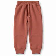 Front view of boys terracotta fleece joggers with drawstring waist and ribbed cuffs