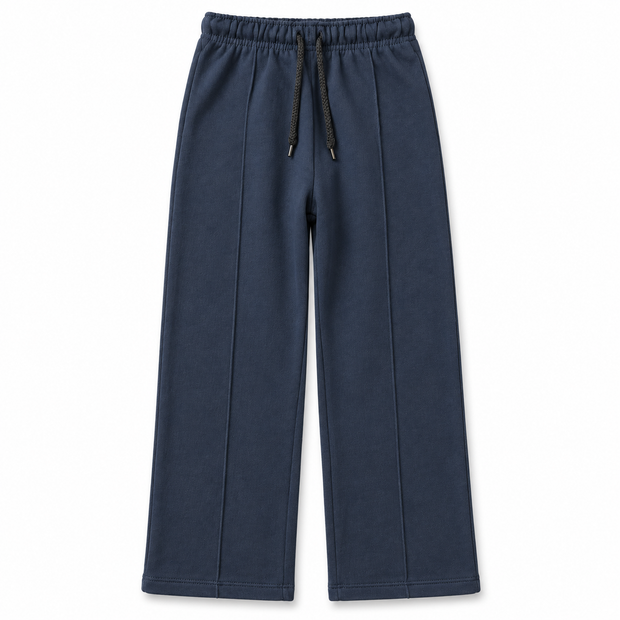 Front view of boys and girls navy blue terry trousers with straight-leg fit, front seams and black drawstring waist