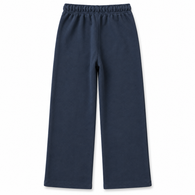 Back view of boys and girls navy blue terry straight-leg trousers with elasticated waistband